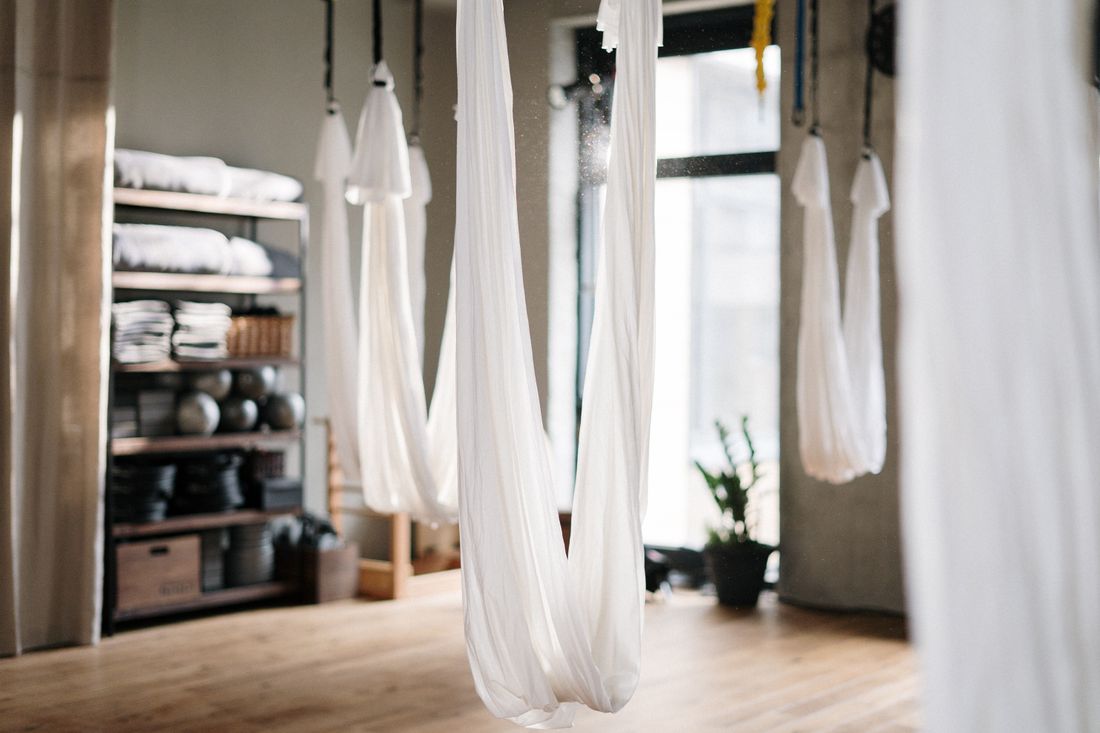 A calm, sunlit massage studio